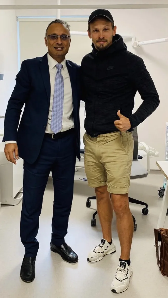Joel with Mr Trikha after his knee treatment