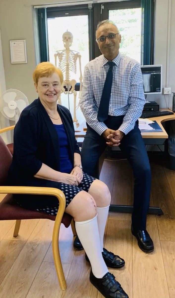 Lucy with Mr Trikha after her knee treatment